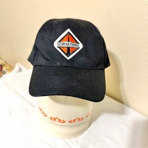 International Trucks SnapBack Black Cap with orange and white logo